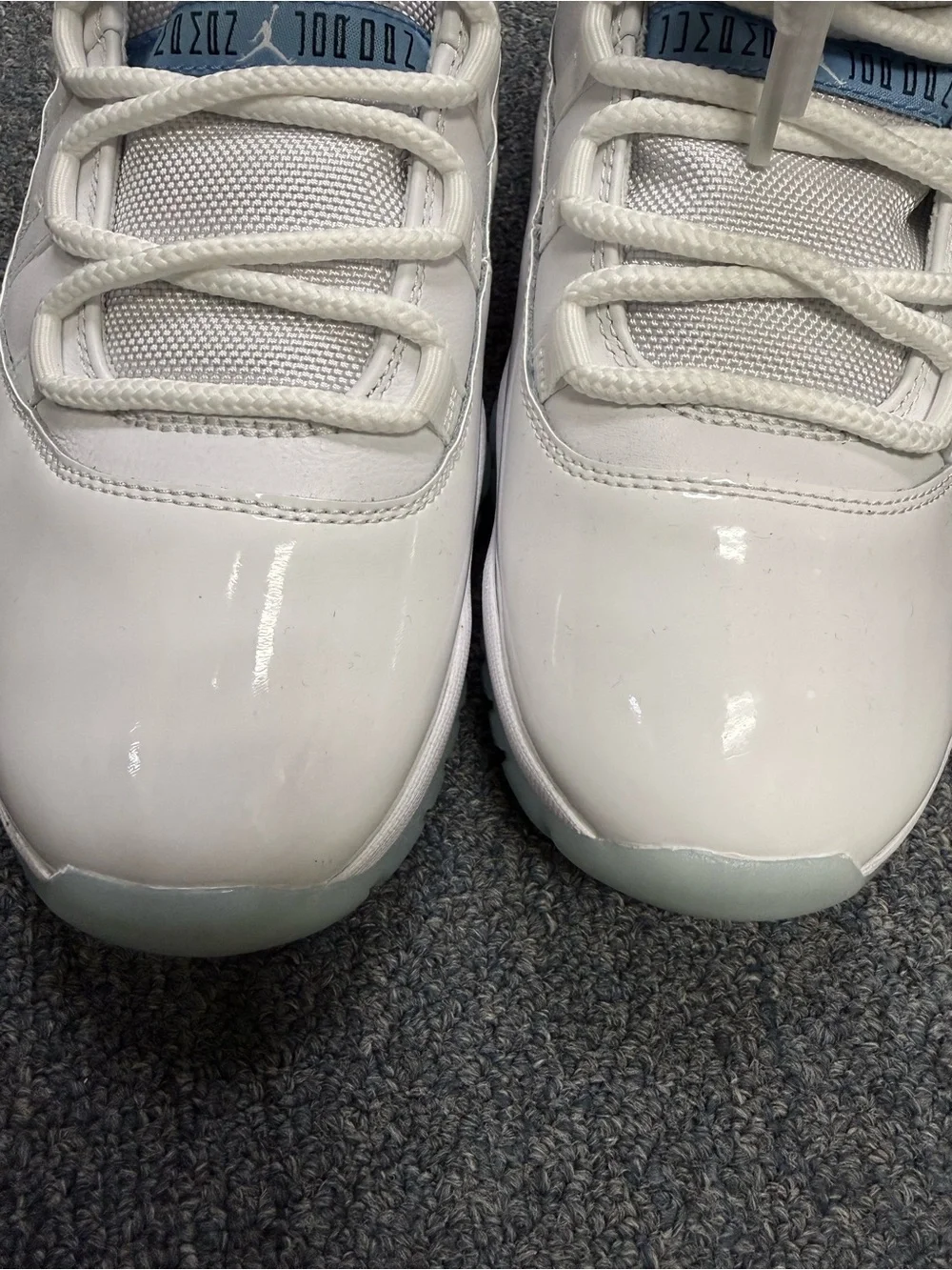Jordan Men's White and Black Athletic Shoes with Ice Blue Accents - Picture 7 of 10